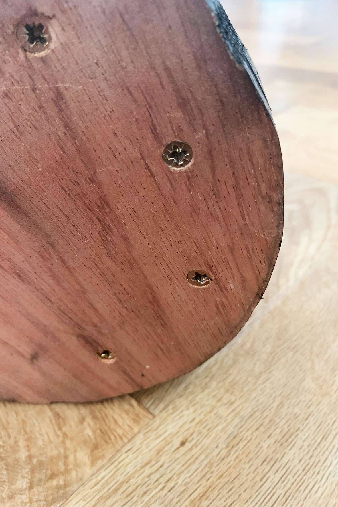 bottom of plywood base with screws in