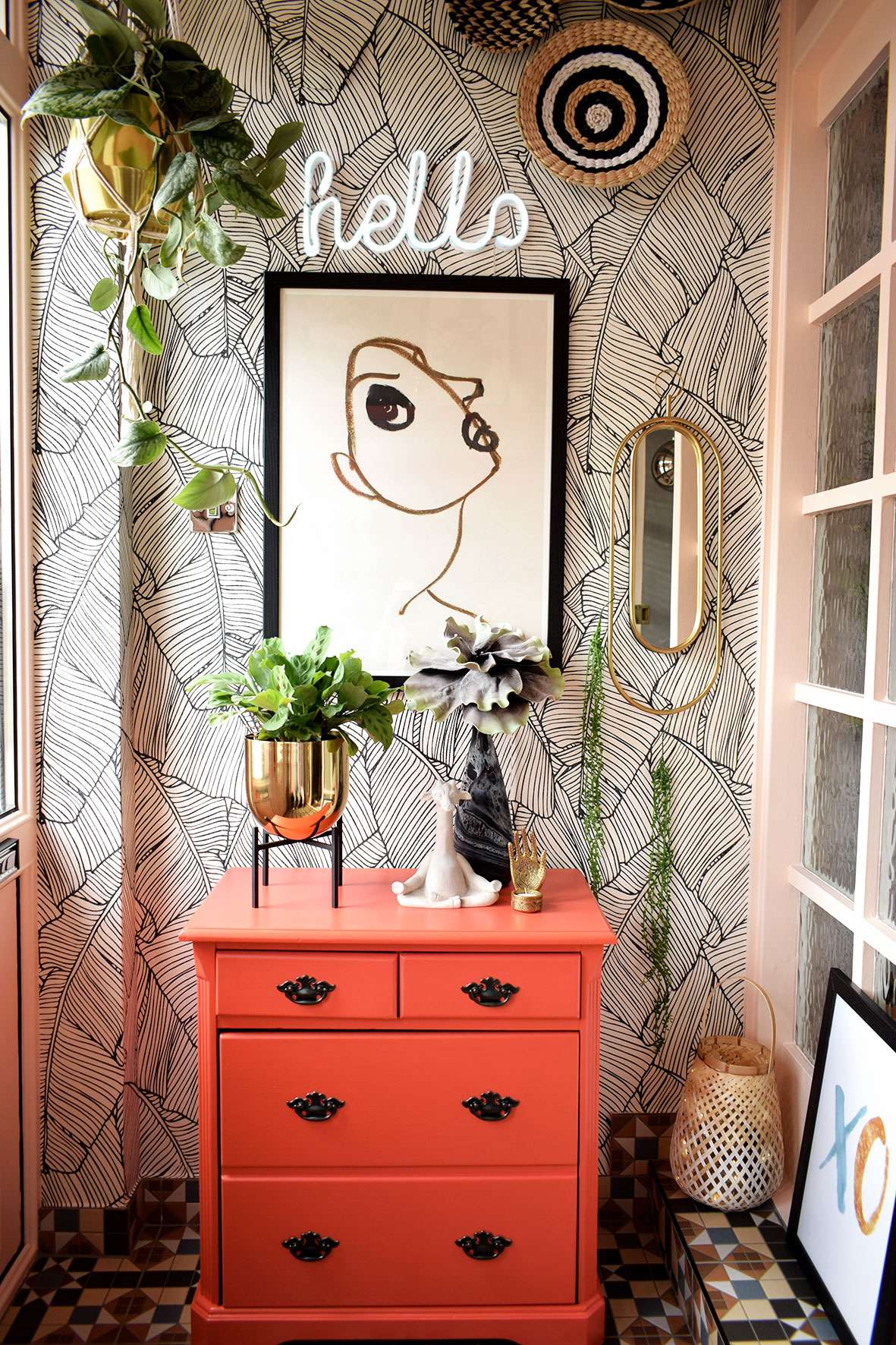 Porch decorated in boho style with peach and coral colour scheme.