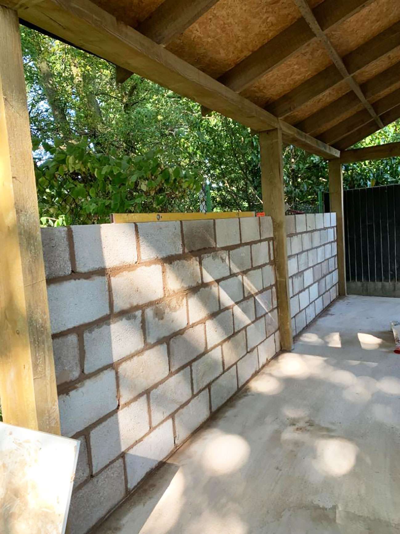 Part built man cave in garden.