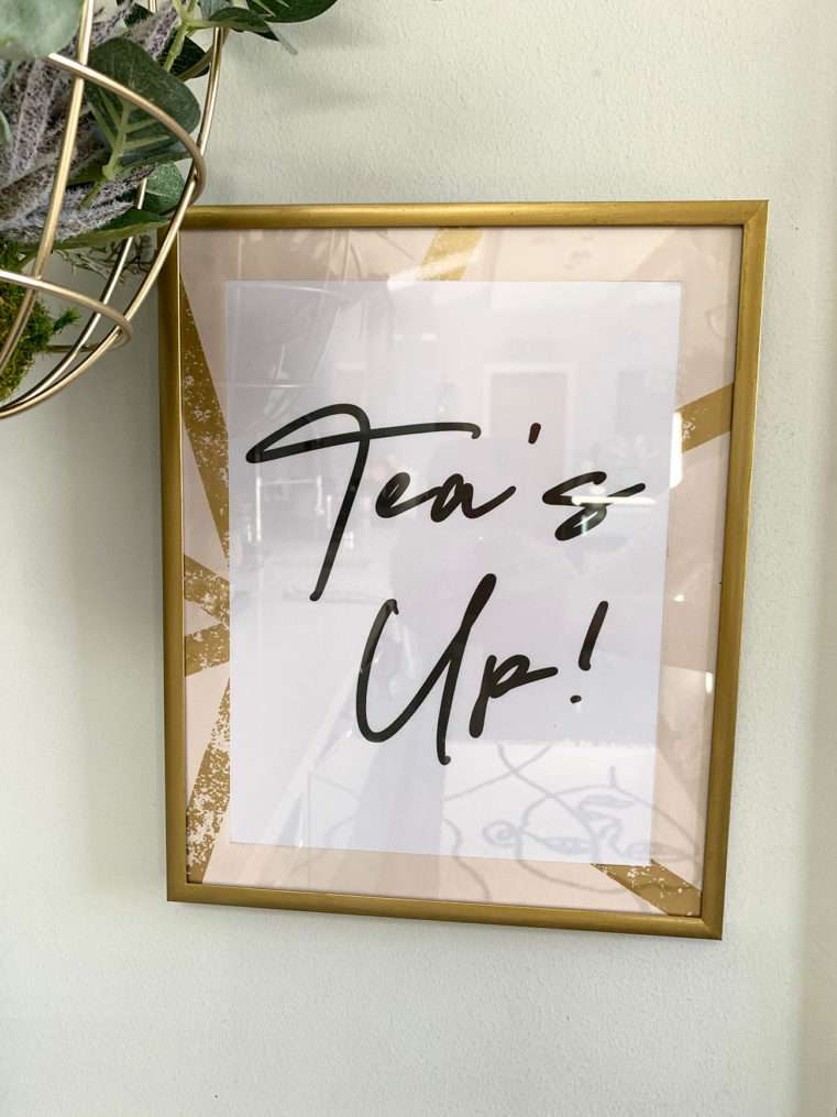tea's up typography print with pink and gold mount and frame.