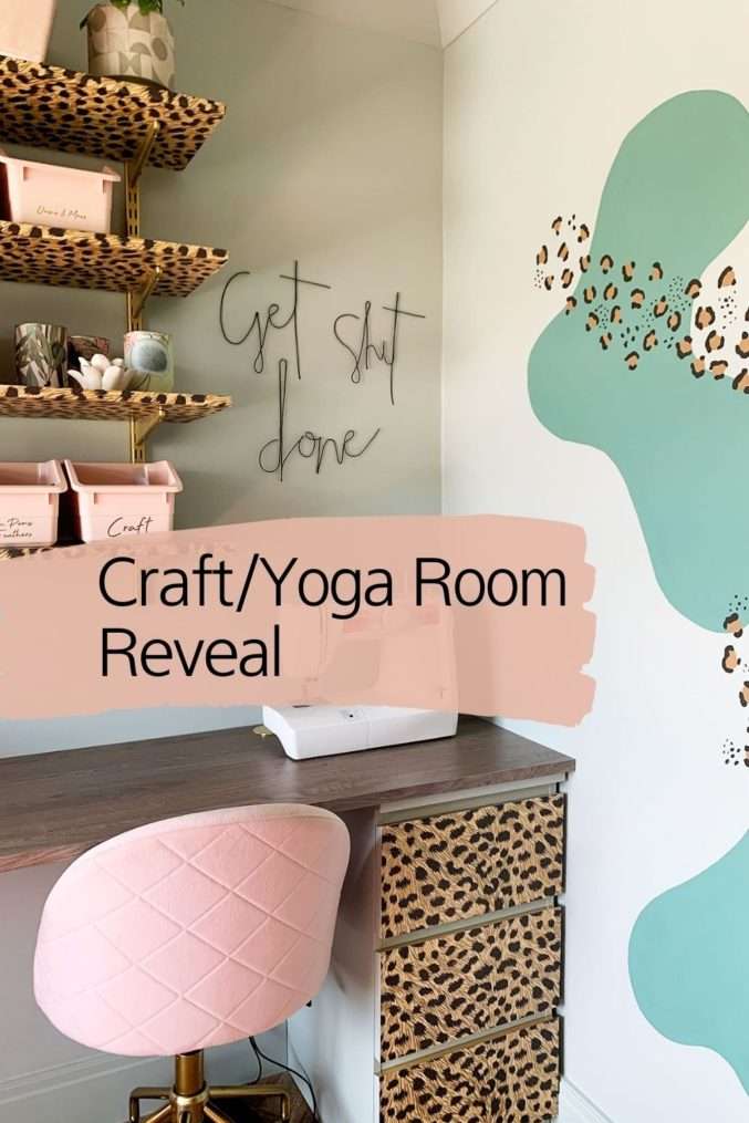 Corner shot of room decorated in soft green, blush, and leopard print with Text Overlay saying Craft/Yoga Room Reveal.