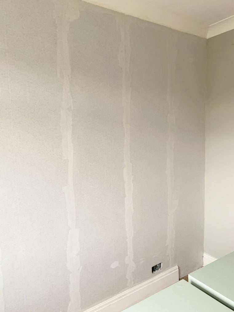 Wall with insulating wallpaper.
