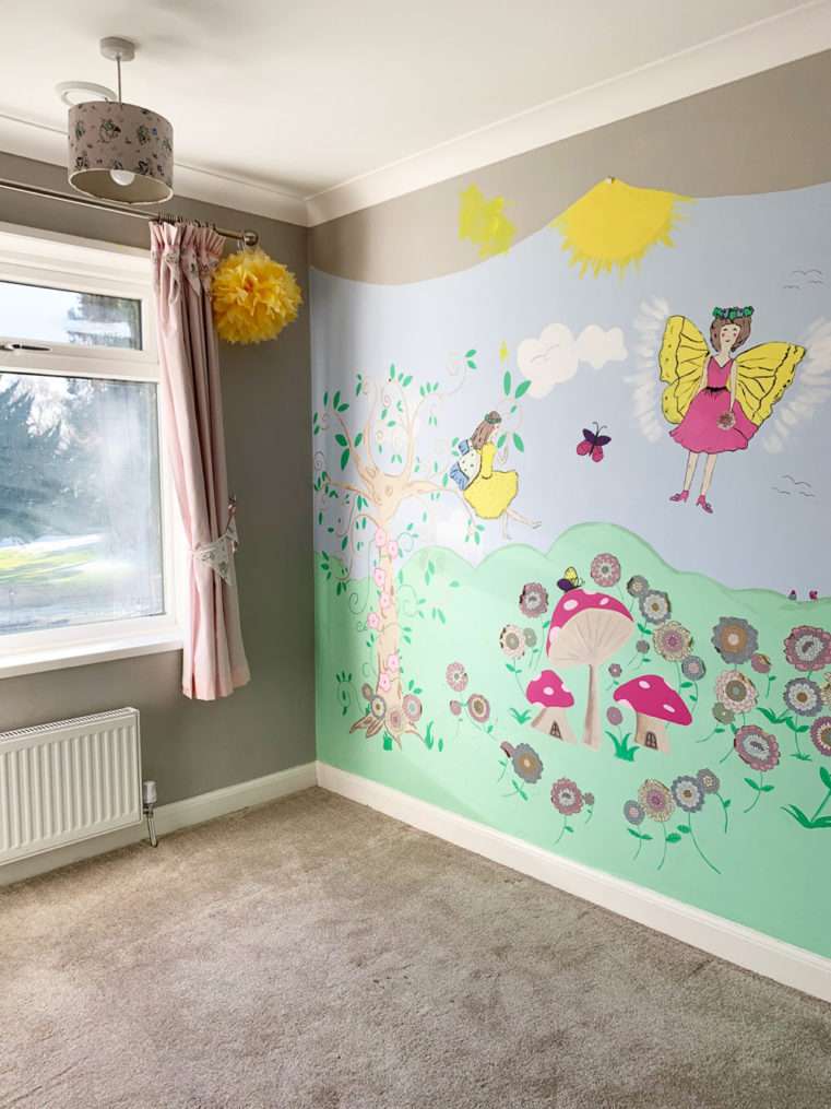 Before shot of room as a children's bedroom with a fairy mural on the wall.