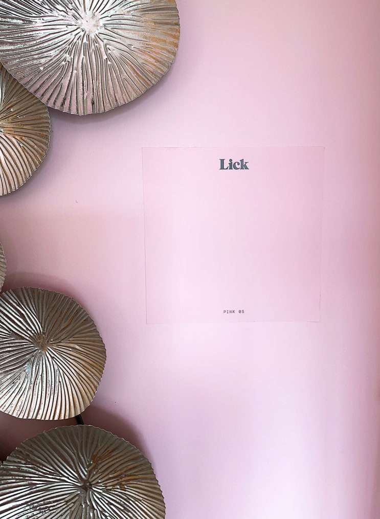 Lick paint sample colour Pink 05 stuck to same coloured painted wall.